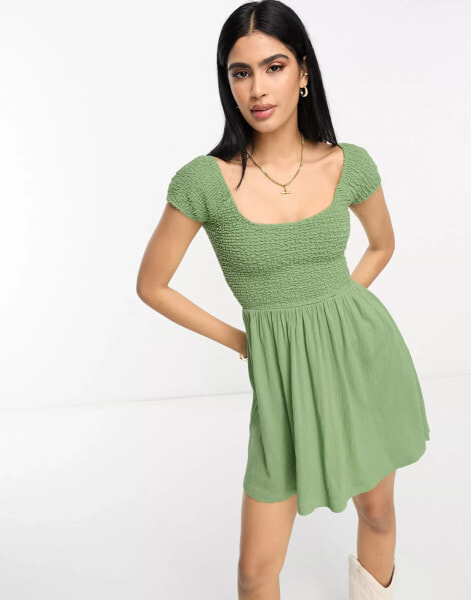 ASOS DESIGN scoop neck cap sleeve crinkle shirred mini dress in light khaki