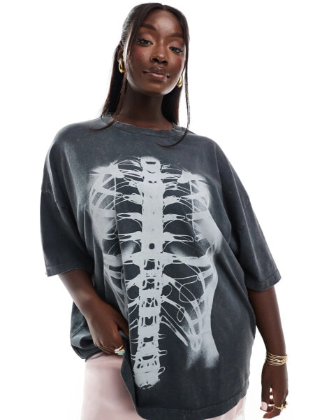 ASOS DESIGN Curve Halloween oversized t-shirt with xray skeleton print in washed charcoal