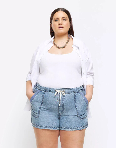 River Island Plus tie waist denim shorts in mid blue wash