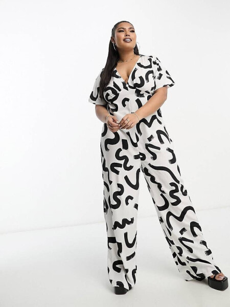 Vero Moda Curve wide leg jumpsuit in mono abstract print 