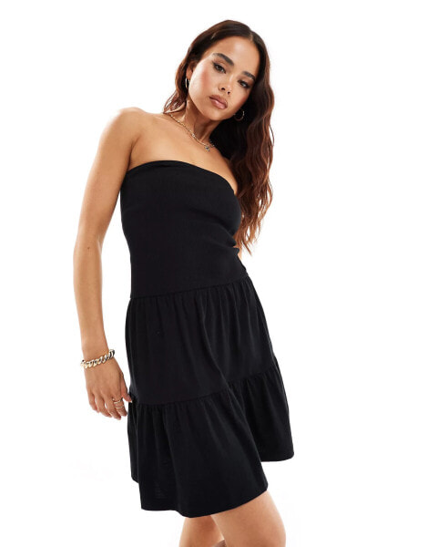 ASOS DESIGN mini bandeau dress with tiered skirt in black