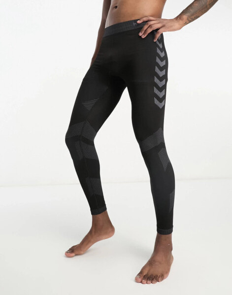 Hummel – First – Nahtlose Jersey-Leggings in Schwarz