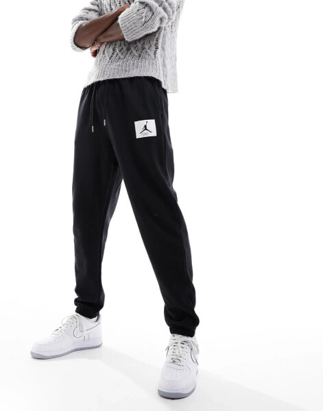 Jordan Flight Essentials fleece joggers in black