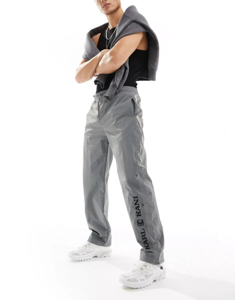 Karl Kani retro wide leg track joggers in reflective grey