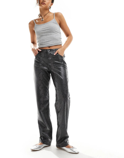 Noisy May faux leather slim fit trousers in grey snake print