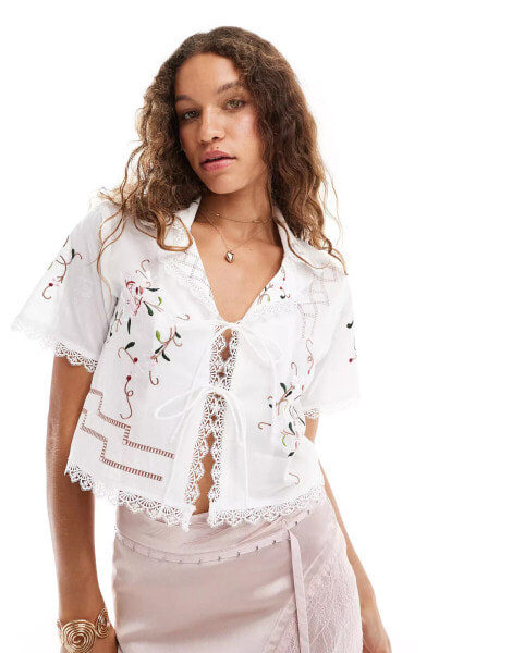 Reclaimed Vintage tie front western shirt with tablecloth embroidery detail in white