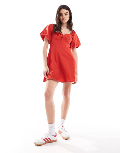 Wednesday's Girl bow detail puff sleeve textured mini dress in red