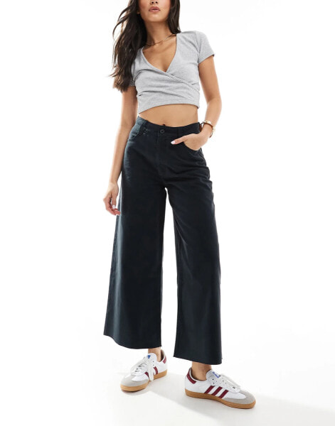 ASOS DESIGN cropped wide leg trouser with raw hem in black