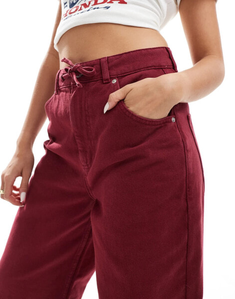 ASOS DESIGN dad jeans with self belt in burgundy