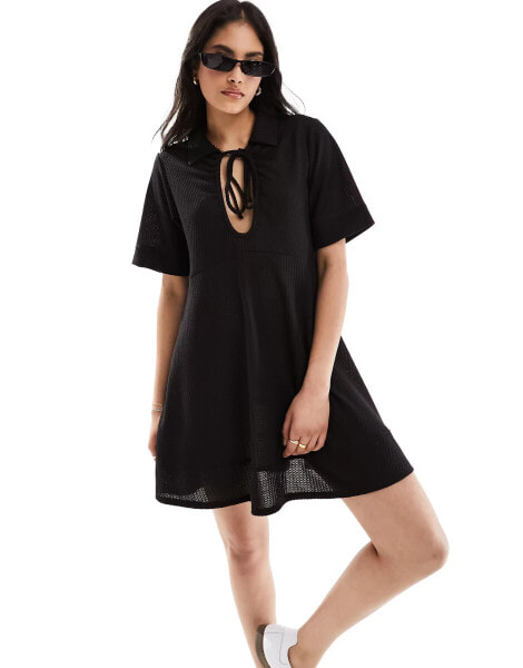 ASOS DESIGN waffle tie front smock mini dress in black