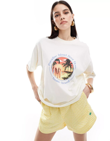 ASOS DESIGN oversized t-shirt with paradise island beer drink graphic in cream