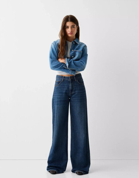 Bershka Petite high waisted wide leg jeans in dark blue