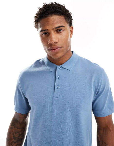 ASOS DESIGN pique polo in mid blue