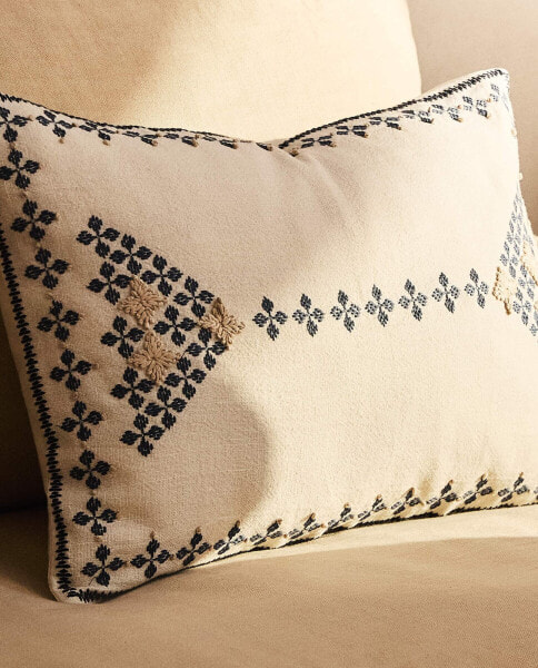 Embroidered cushion cover