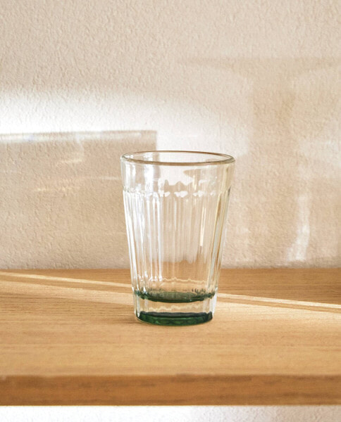 Raised design glass tumbler