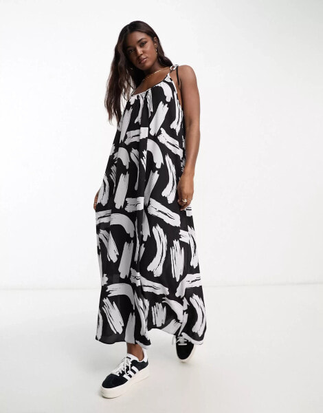 ASOS DESIGN tie strap detail trapeze maxi slip dress in mono brush stroke print