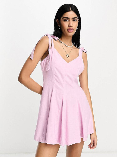 ASOS DESIGN linen tie cross strap swing mini sundress with godets in pink