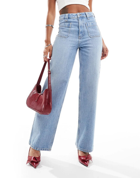 New Look wide leg patch pocket jeans in mid blue