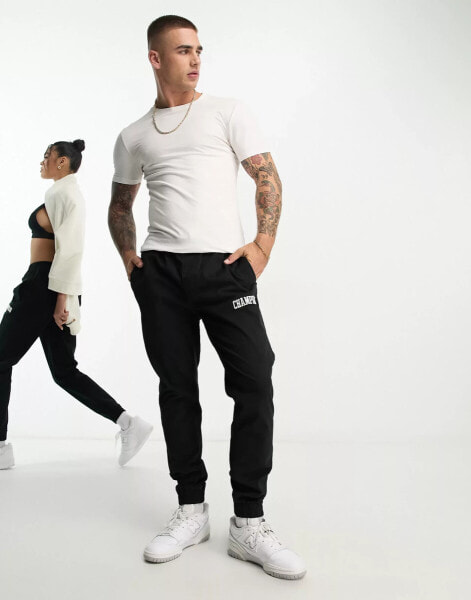 Champion unisex small logo joggers in black