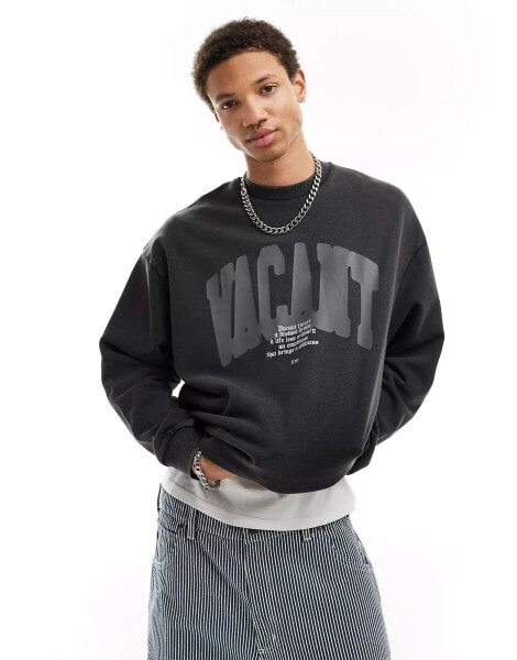 ASOS DESIGN oversized sweatshirt in washed charcoal with front text print