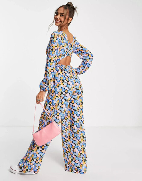 ASOS DESIGN bubble crepe button back long sleeve jumpsuit in blue floral