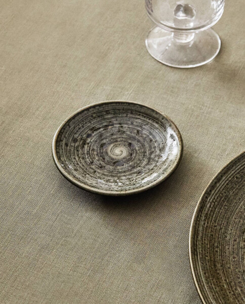 Earthenware side plate with spiral design