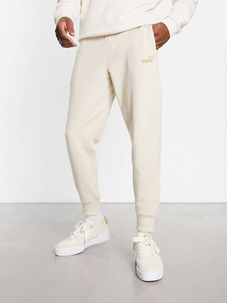 Puma essentials small logo joggers in off white