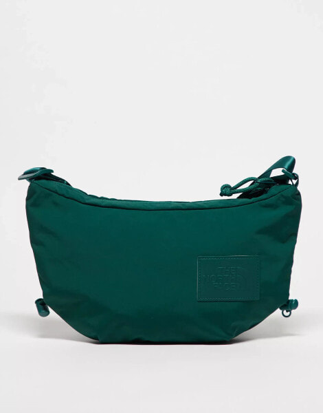 The North Face Never Stop logo crossbody bag in green