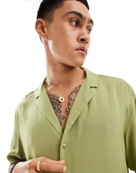 ASOS DESIGN relaxed fit viscose shirt with low revere collar in olive green