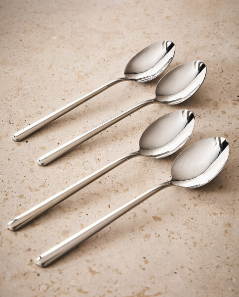 Set of shiny steel spoons