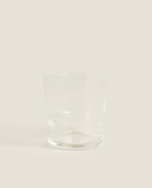 Raised design glass tumbler