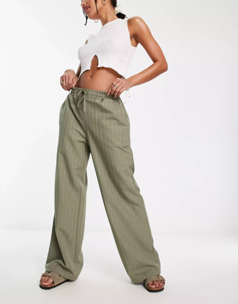 ASOS DESIGN pull on trouser in khaki stripe