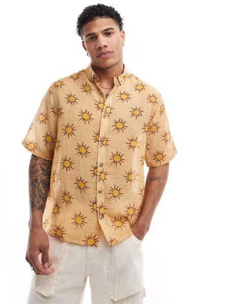 ASOS DESIGN boxy relaxed shirt with sun print in yellow