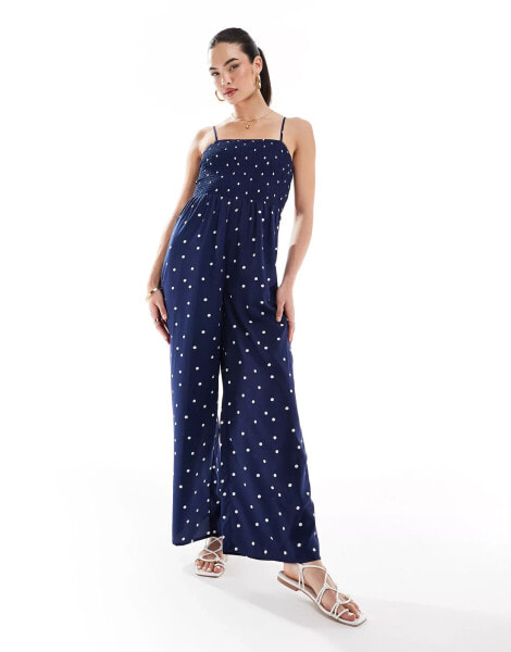 Wednesday's Girl polka dot smocked jumpsuit in navy and cream