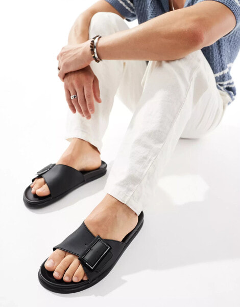 Truffle Collection single buckle sandals in black