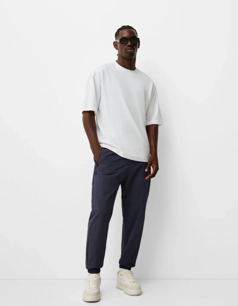 Bershka nylon trouser in navy