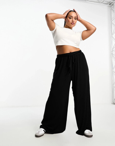 ASOS DESIGN Curve tie belt wide leg trouser in black