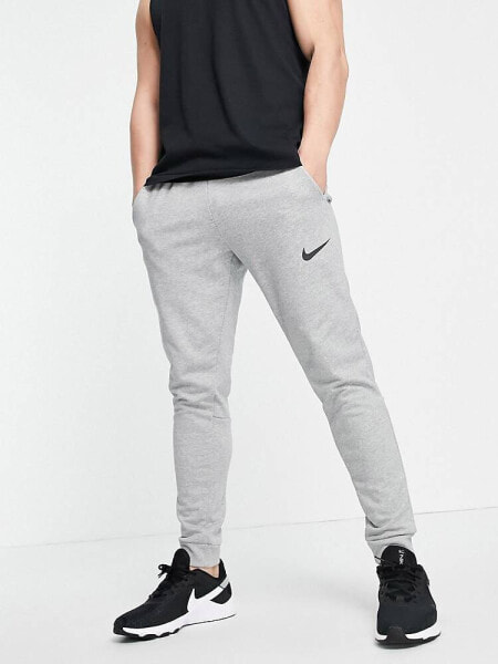 Nike Training Dri-FIT tapered joggers in light grey