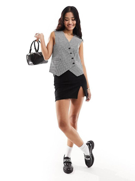 ASOS DESIGN  asymmetric waistcoat in houndstooth