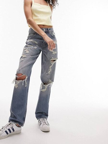 Topshop Dad jeans with extreme rip & repair in mid blue