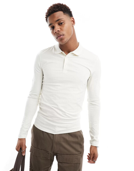 ASOS DESIGN long sleeved muscle fit polo shirt in beige