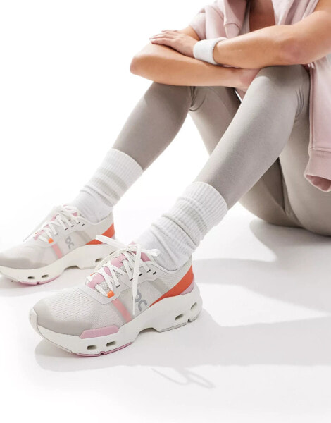 ON Cloudpulse trainers in white and orange