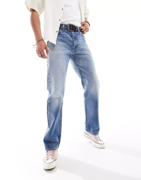 Levi's 555 relaxed straight fit jeans in mid blue