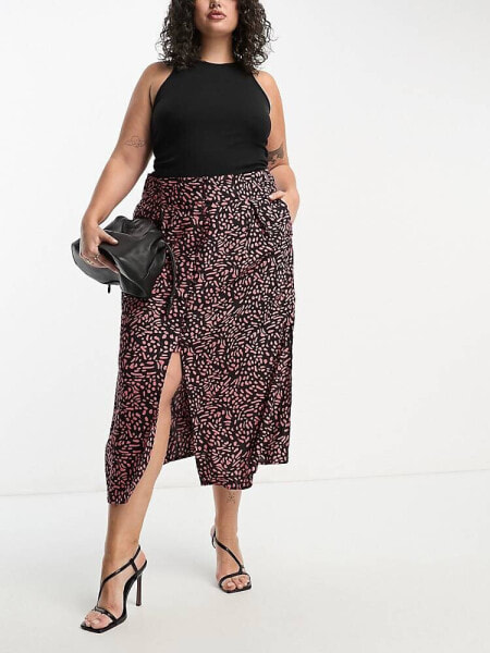 ASOS DESIGN Curve button through midi skirt with split in abstract orange print 