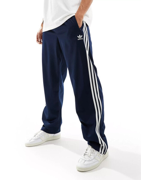 adidas Originals firebird track pants in navy