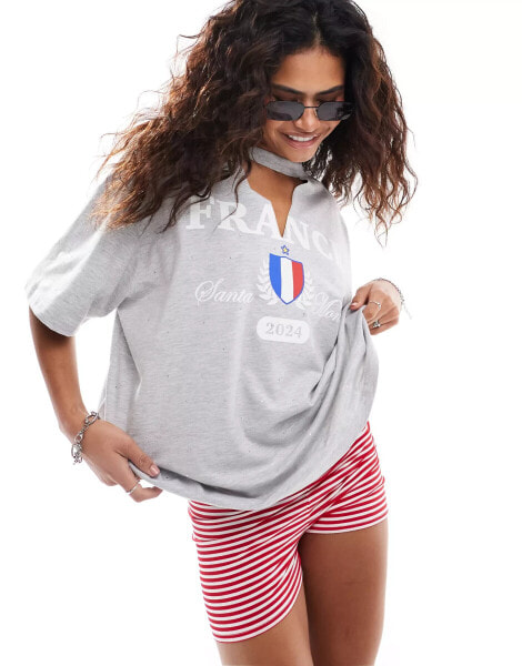 ASOS DESIGN v neck oversized t-shirt with all over hotfix with france football graphic in grey marl