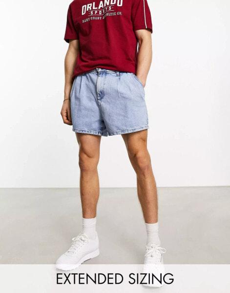 ASOS DESIGN pleated mid length denim short in mid wash blue