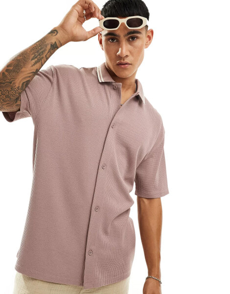 ASOS DESIGN relaxed button-up polo shirt in pink