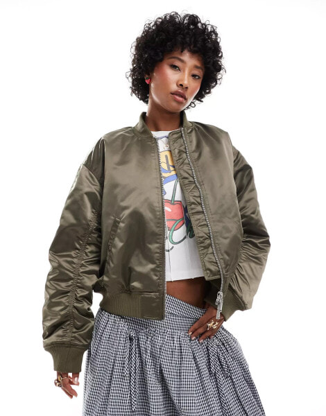 Monki satin bomber jacket with front welt pockets in khaki green with pink lining