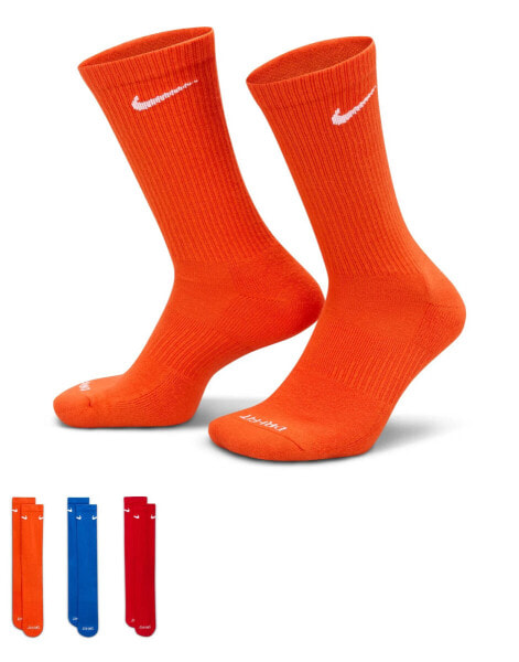 Nike Training Everyday Cushioned Plus 3 pack crew socks in orange, blue and red